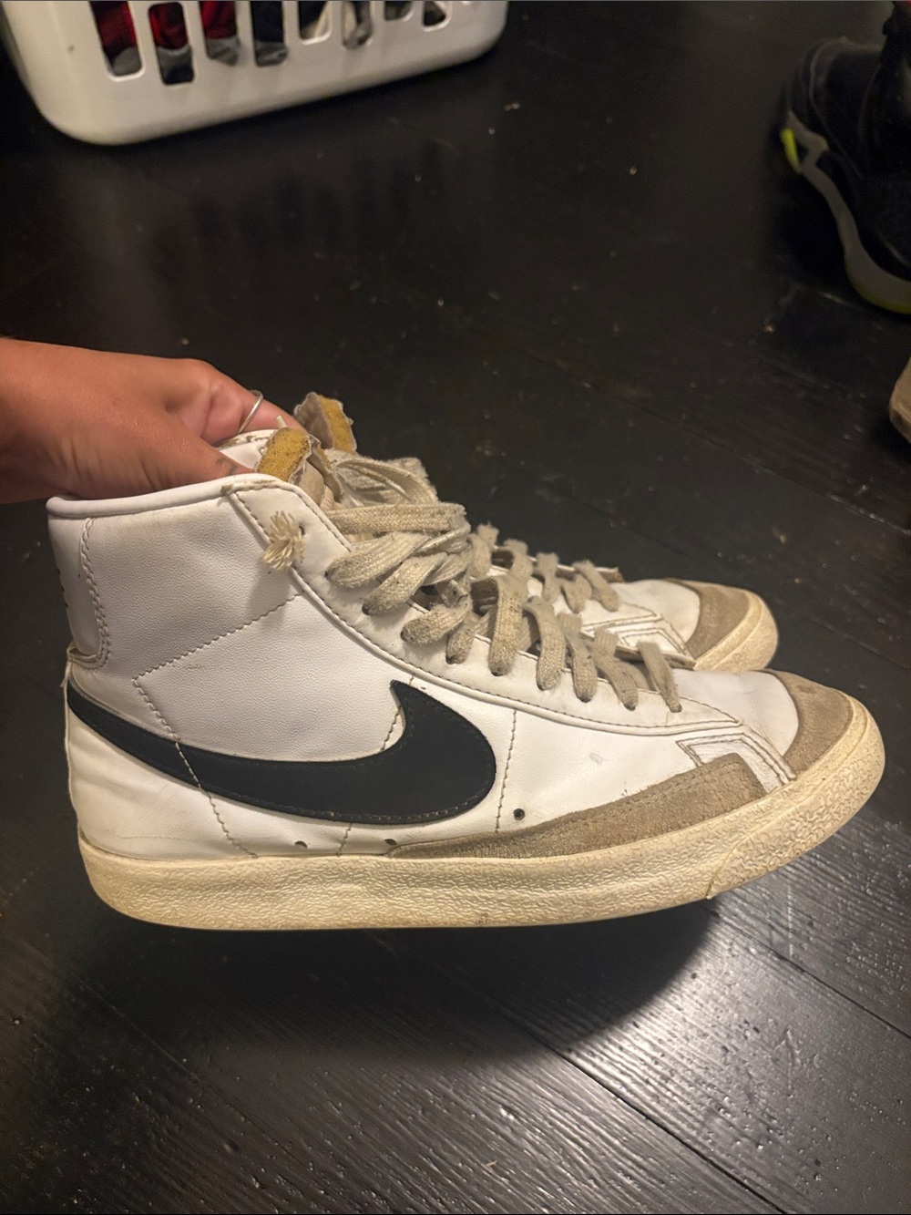 Nike Woman’s White High-Top Sneakers with Black Swoosh